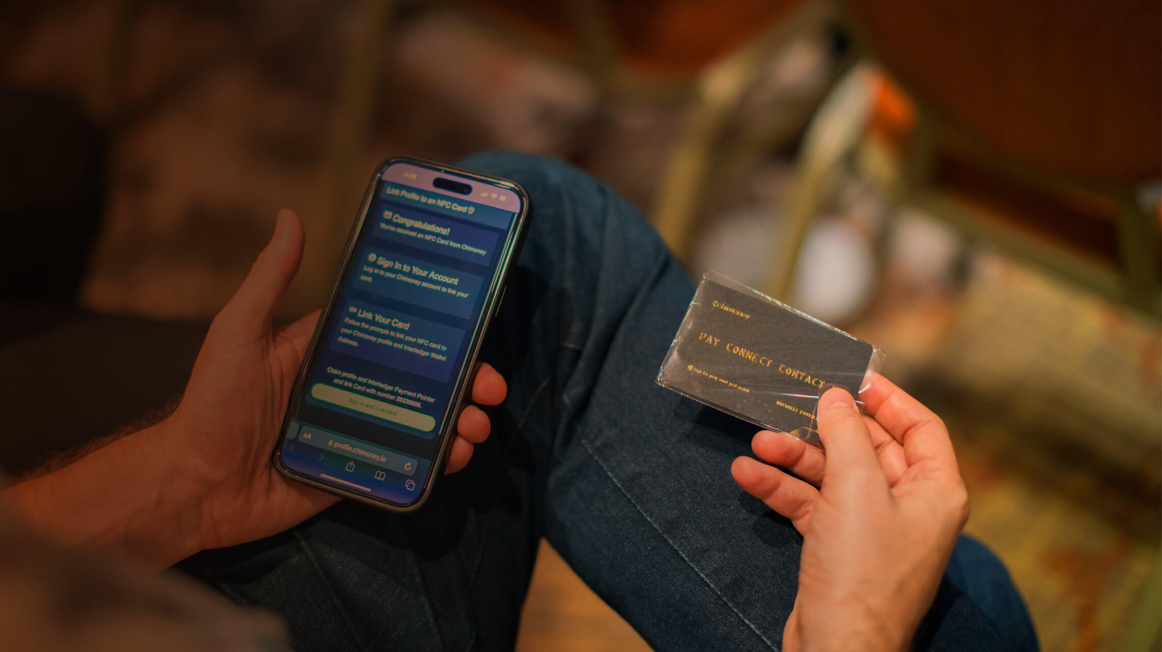 A person holds a Chimoney Pay Connect Contact NFC card and a phone showing Chimoney's card-linking flow